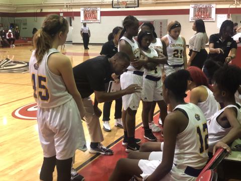 Columbia coach Anthony Perry coaches up his team during a timeout during Friday’s game against Oak Hall in the Hitchcock’s Challenge. (ZACH ABOLVERDI/Lake City Reporter)