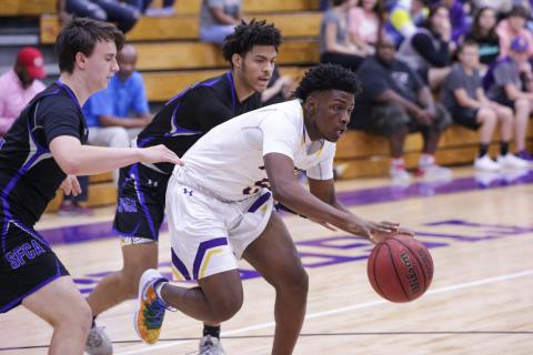 Columbia guard Darrien Jones drives through Saint Francis Catholic's defense on Tuesday night. (BRENT KUYKENDALL/Lake City Reporter)
