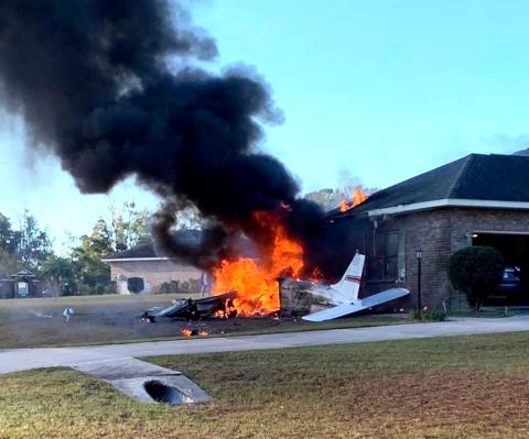 A plane piloted by a Texas woman exploded in flames after crashing into an Inwood Court Saturday morning. The Lake City Reporter has chosen not to identify the woman until next of kin has been notified. (Photo by AMY BROWN via Facebook)