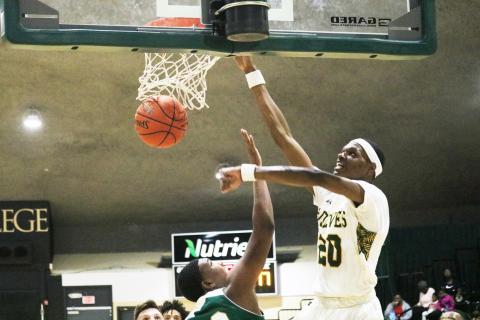 FGC center Jeremiah Tisme dunks against Webber International’s JV team on Wednesday night. (JORDAN KROEGER/Lake City Reporter)