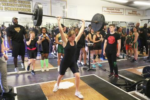 Columbia’s Morgan Hoyle finishes her clean and jerk to break her own school record in the 129-pound weight class with a lift of 145 pounds at the District 2-2A meet on Friday. (JORDAN KROEGER/Lake City Reporter)