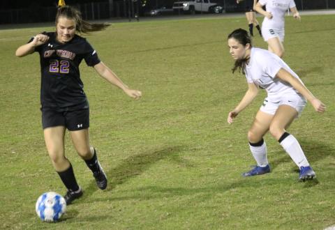 Columbia’s Hannah Dicks moves the ball up the field against Forest on Friday night. (JORDAN KROEGER/Lake City Reporter)