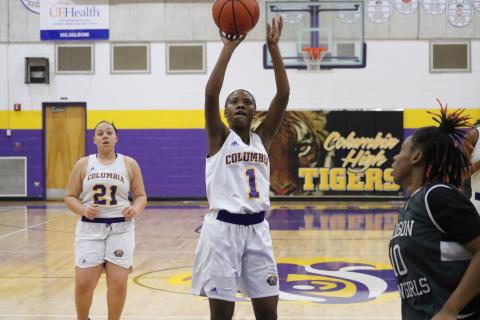 Columbia guard Anzarria Jerkins pulls up for a jumper against Madison County on Tuesday night. (ZACH ABOLVERDI/Lake City Reporter)