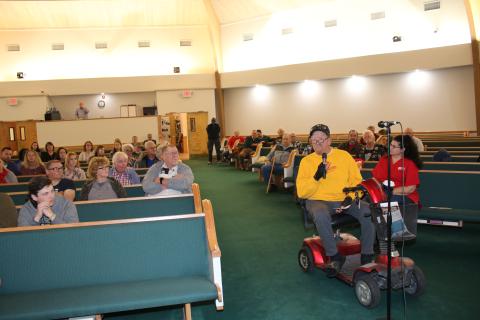 Jay Morrow, a retired Marine, asks questions during a town hall meeting on services that are no longer available at the Lake City VA Medical Center. (TONY BRITT/Lake City Reporter)