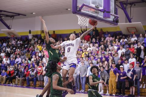 Columbia guard Jordan Smith scores a layup after a steal against Lincoln during Tuesday night's Region 1-6A semifinal. (BRENT KUYKENDALL/Lake City Reporter)