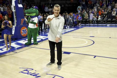 Former University of Florida head coach and Gator legend Billy Donovan does the Gator Chomp as the court is renamed Billy Donovan Court during Saturday’s game against Vanderbilt. (AP PHOTO)