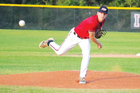 Fort White pitcher Tyler Shelnut throws to a batter in a game last season. (FILE)