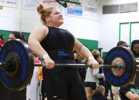 Columbia weightlifter Reece Chasteen lifts the bar during her clean and jerk at the Region 1-2A Meet on Saturday. (JEN CHASTEEN/Special to the Reporter)