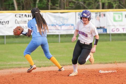 Columbia third baseman Morgan Hoyle rounds second base and heads to third on one of her two triples in Tuesday’s game against Chiefland. (BRENT KUYKENDALL/Lake City Reporter)