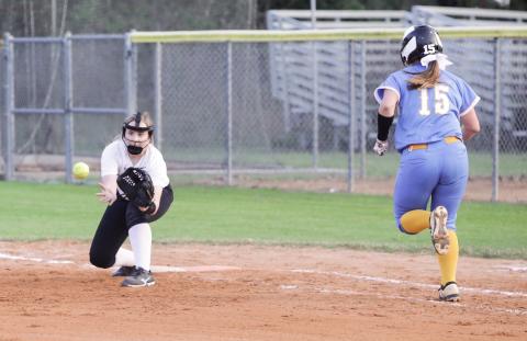 Columbia first baseman Addison Maxwell records an out against Chiefland on March 10. (BRENT KUYKENDALL/Lake City Reporter)