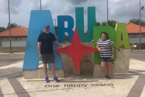 Lake City residents Ovidiu and Sondra Deaconescu pose for a picture in Aruba while on a cruise. Their trip was unexpectedly extended yesterday, when Puerto Rican officials refused to let passengers from the ship disembark. (COURTESY)