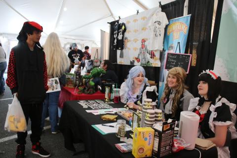 The Idols a la Carte of Tallahassee answer questions about their anime event called Maid Cafe and take photos with convention attendees. (AMY HIETT/Special to the Reporter)