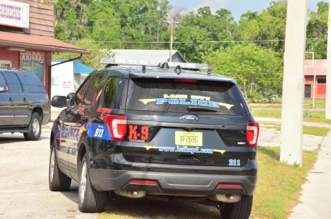 The Lake City Police Department responds to an aborted attempt at armed robbery off U.S. Highway 90. The Columbia County Sheriff’s Office assisted at the scene, where a man tried to rob North florida Auto Exchange by flashing a gun at an employee inside, but quickly took off when the worker pulled out a gun of his own. (CARL MCKINNEY/Lake City Reporter)