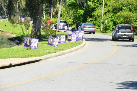 The placards dotted the perimeter of the lake. (CARL MCKINNEY/Lake City Reporter)