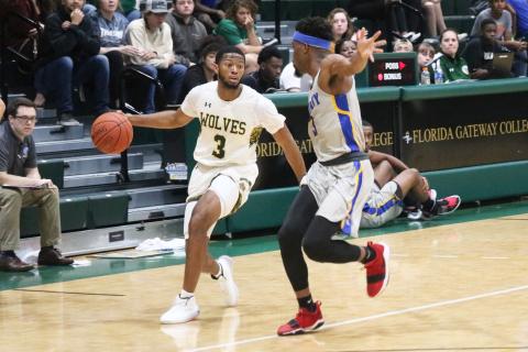FGC guard Kenny Brown Jr. looks to drive against Trinity Baptist on Jan. 16. (JORDAN KROEGER/Lake City Reporter)