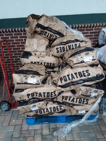 Bags of potatoes and more were available to Columbia County families in need by way of the Worship Room. (TOM NOTON/Special to the Reporter)