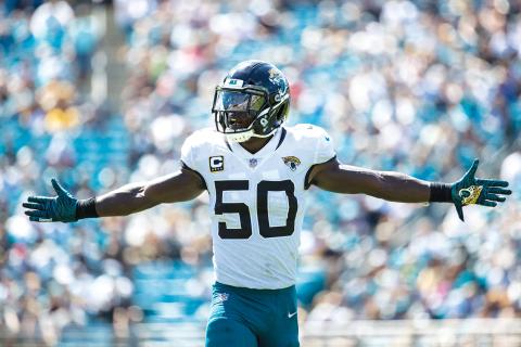 Jacksonville Jaguars linebacker Telvin Smith (50) celebrates a tackle in the second quarter versus the Tennessee Titans at TIAA Bank Field on Sept. 23, 2018, in Jacksonville. (TRIBUNE NEWS SERVICE)