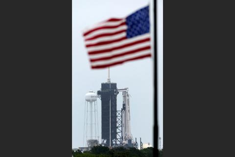 The SpaceX Falcon 9, with the Crew Dragon spacecraft on top of the rocket, sits on Launch Pad 39-A on Monday at Kennedy Space Center. Two astronauts will fly on the SpaceX Demo-2 mission to the International Space Station scheduled for launch on Wednesday. (DAVID J. PHILLIP/AP Photo)