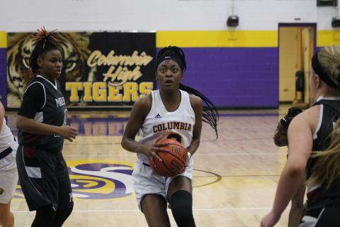 Columbia guard Na’Haviya Paxton gets set to take a shot against Madison County on Jan. 28. (FILE)