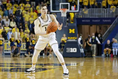 Michigan sophomore Colin Castleton is transferring to Florida. (MIKE MULHOLLAND/TNS)