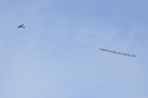 For about an hour Tuesday afternoon, a plane flew over the school, downtown and the U.S. Highway 90 corridor to display the message, “Congratulations CHS Class of 2020.”  The plane flies over CHS before continuing its circuit. The pandemic threw a wrench into seniors’ prom and graduation plans, so the school says it wanted to make a gesture showing the students were not forgotten. (CARL MCKINNEY/Lake City Reporter)