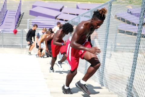 Columbia receiver Jaden Williams runs up the stadium steps during a summer workout in 2018. (FILE)