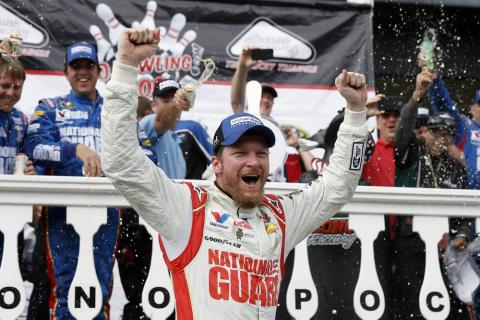 Dale Earnhardt Jr. celebrates in Victory Lane after winning a NASCAR Sprint Cup Series auto race at Pocono Raceway on Aug. 3, 2014, in Long Pond, Pa. (AP FILE PHOTO)