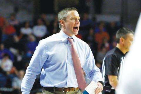 Florida coach Mike White yells to his players during a game against Mississippi on Jan. 14, in Gainesville. (AP FILE PHOTO)