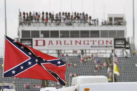AConfederate flag flies in the infield before a NASCAR Xfinity auto race at Darlington Raceway on Sept. 5, 2015, in Darlington, S.C. (TERRY RENNA/AP File photo)