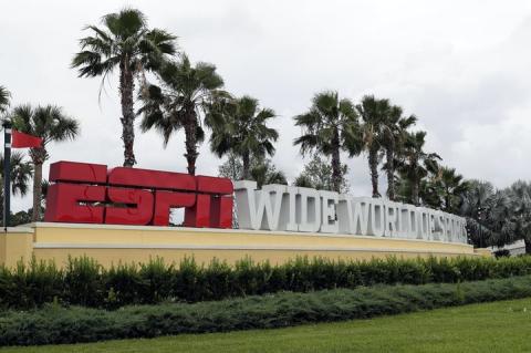 A sign marking the entrance to ESPN's Wide World of Sports at Walt Disney World is seen Wednesday, in Kissimmee. (JOHN RAOUX/AP Photo)