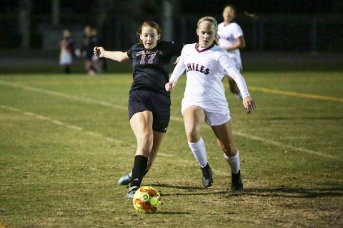 Columbia midfielder Adriana Watson chases down possession of the ball against Chiles during a match in 2018. (BRENT KUYKENDALL/Lake City Reporter)