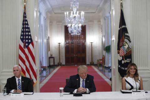 President Donald Trump, Vice President Mike Pence, left, and first lady Melania Trump, attend a “National Dialogue on Safely Reopening America’s Schools,” event in the East Room of the White House, Tuesday in Washington. The conversation continues on the state level as well. (ALEX BRANDON/AP)