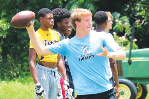 Columbia quarterback Kade Jackson throws during conditioning last summer. (FILE)
