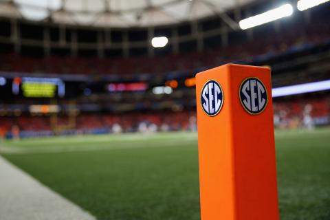 An SEC logo is seen on an end zone pylon before the Missouri Tigers take on the Auburn Tigers during the SEC Championship Game on Dec. 7, 2013 at the Georgia Dome in Atlanta, Georgia. The conference announced Tuesday that it's postponing the start of its volleyball, soccer and cross country seasons through at least Aug. 31. (MIKE EHRMANN/Getty Images/TNS)