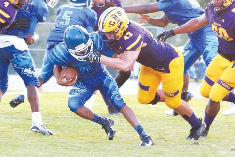 Columbia defensive end Jaiden Tillotson makes a tackle against AA Christian last season. (FILE)
