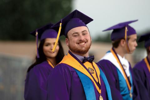 Drew Law smiles prior to Columbia’s commencement ceremony Saturday night. (RAY CARPENTER/Lake City Reporter)
