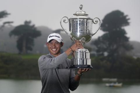 Collin Morikawa holds the Wanamaker Trophy after winning the PGA Championship golf tournament at TPC Harding Park on Sunday, in San Francisco. (JEFF CHIU/Associated Press)