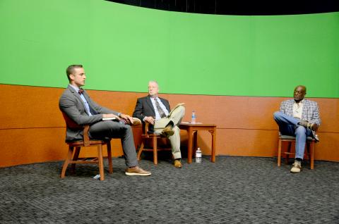 Noah Walker, left, and Jake Hill, candidates for the Lake City Council District 12 seat, discussed expanding the city’s utilities during the candidate forum Thursday night. (CARL MCKINNEY/Lake City Reporter)