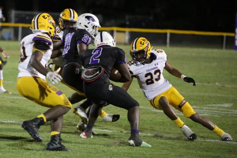 Columbia safety Dante Brown moves in to make a tackle during last year’s game against Gainesville. (BRENT KUYKENDALL/Lake City Reporter)