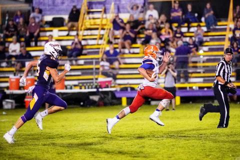 Branford running back Bodhi White breaks away to score one of his three touchdowns against Bell on Friday. (BRIAN LEWIS/Special to the Reporter)