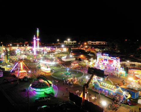 The Florida Gateway Fairgrounds were aglow last year by the midway at the Florida Gateway Fair, which will return next month. The fair, with additional safety measures in place, is scheduled for Oct. 30 through Nov. 7. (RAY CARPENTER PHOTOGRAPHY FILE)