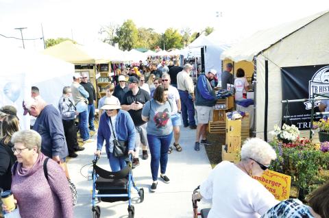 A large crowd of festival-goers milled around Wilson Park at this past year’s Olustee Battle Festival. Lake City’s largest and oldest festival, though, was canceled for February due to health concerns from covid-19. (FILE)