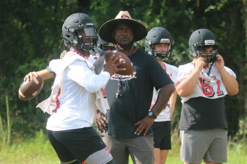 Fort White quarterback Tyler Jefferson drops back to pass during Tuesday’s practice. Jefferson already has college offers from FAU, Kentucky, Maryland and Connecticut. (JORDAN KROEGER/Lake City Reporter)