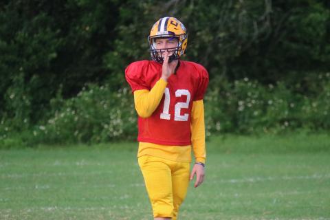 Columbia quarterback Ty Wehinger calls out to a receiver during Tuesday’s practice. (JORDAN KROEGER/Lake City Reporter)