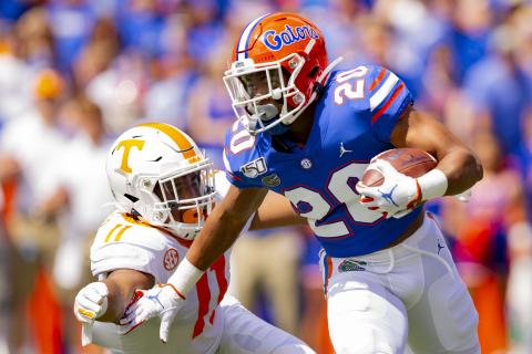 Florida Gators running back Malik Davis, right, carries the ball up the field against Tennessee last season. (CARMEN MANDATO/Getty Images/TNS)