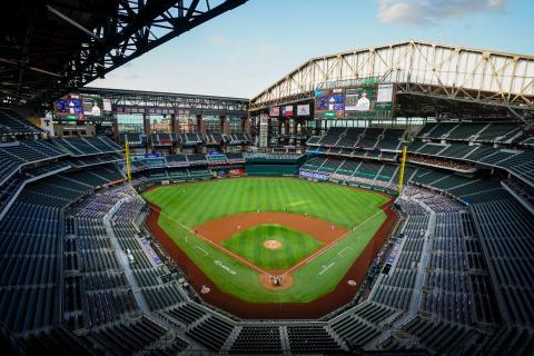 The Texas Rangers face the Oakland Athletics with the roof open during the first inning of game two of a double header at Globe Life Field on Saturday, in Arlington Tex. (SMILEY N. POOL/The Dallas Morning News/TNS)