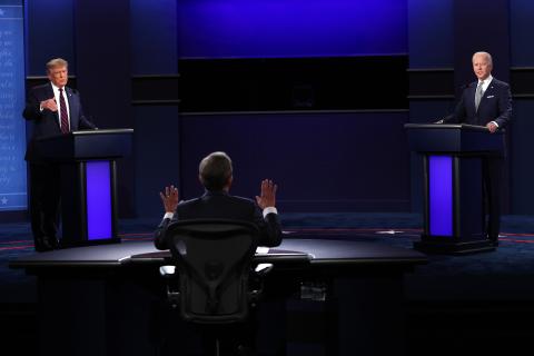 President Donald Trump, left, and Democratic presidential nominee Joe Biden, right, participate in the first presidential debate, moderated by Fox News anchor Chris Wallace at the Health Education Campus of Case Western Reserve University, on Tuesday in Cleveland. (SCOTT OLSON/Getty Images)