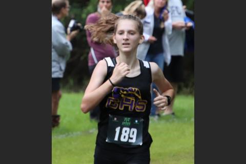Columbia’s Audrey Fender runs during Saturday’s 12th Annual Alligator Lake Invitational. (SHELBY CONKLIN/Lake City Reporter)