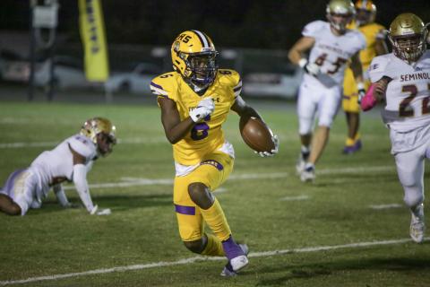 Columbia receiver Tray Tolliver runs up the field after a catch against Florida High last Friday. (BRENT KUYKENDALL/Lake City Reporter)