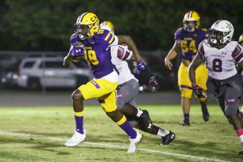 Columbia’s Marcus Peterson picks up a first down on a fake punt last week against Madison County. (BRENT KUYKENDALL/Lake City Reporter)